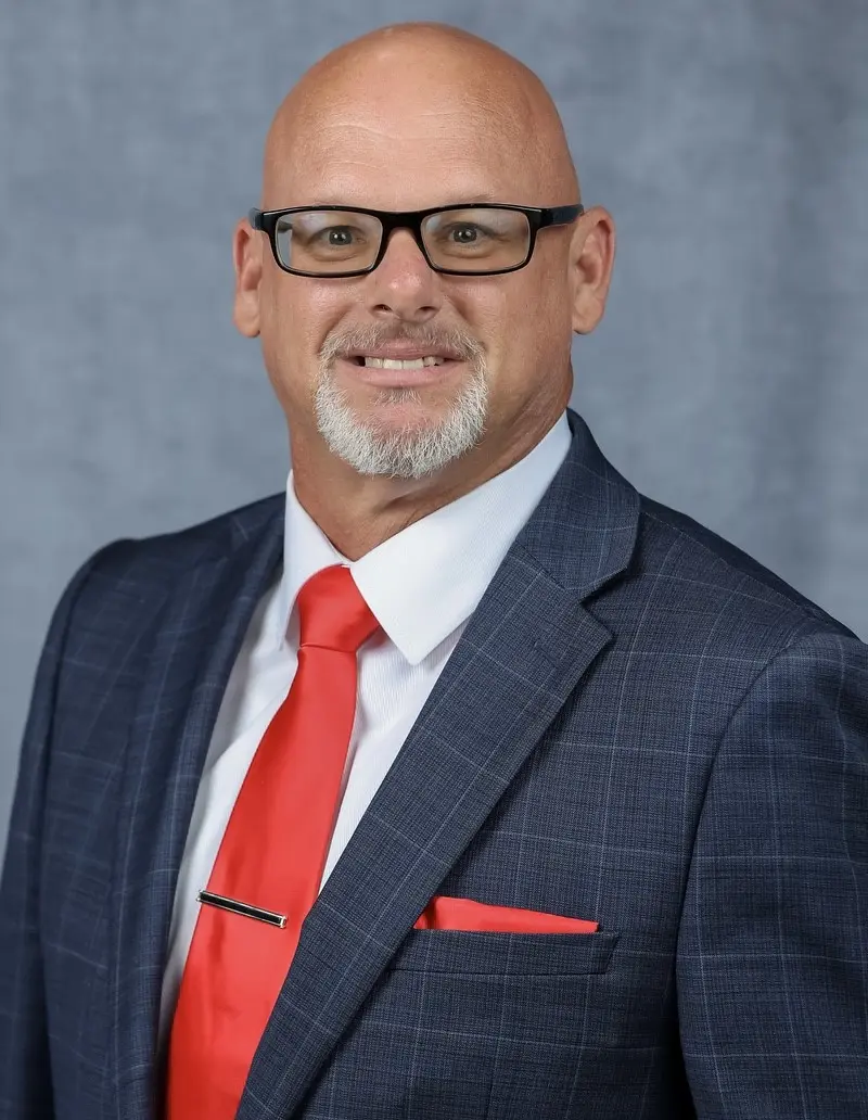 Professional headshot of Christopher Workman